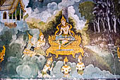 Chiang Mai - Wat Phra That Doi Suthep. The walls of the gallery are covered with Buddha statues and mural paintings of Jataka and tales of the previous lives of the Buddha.